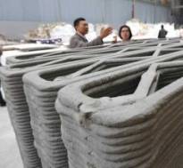 http://static2.businessinsider.com/image/534ec255eab8ea512a24be5e/how-a-chinese-company-3-d-printed-10-houses-in-a-day.jpg